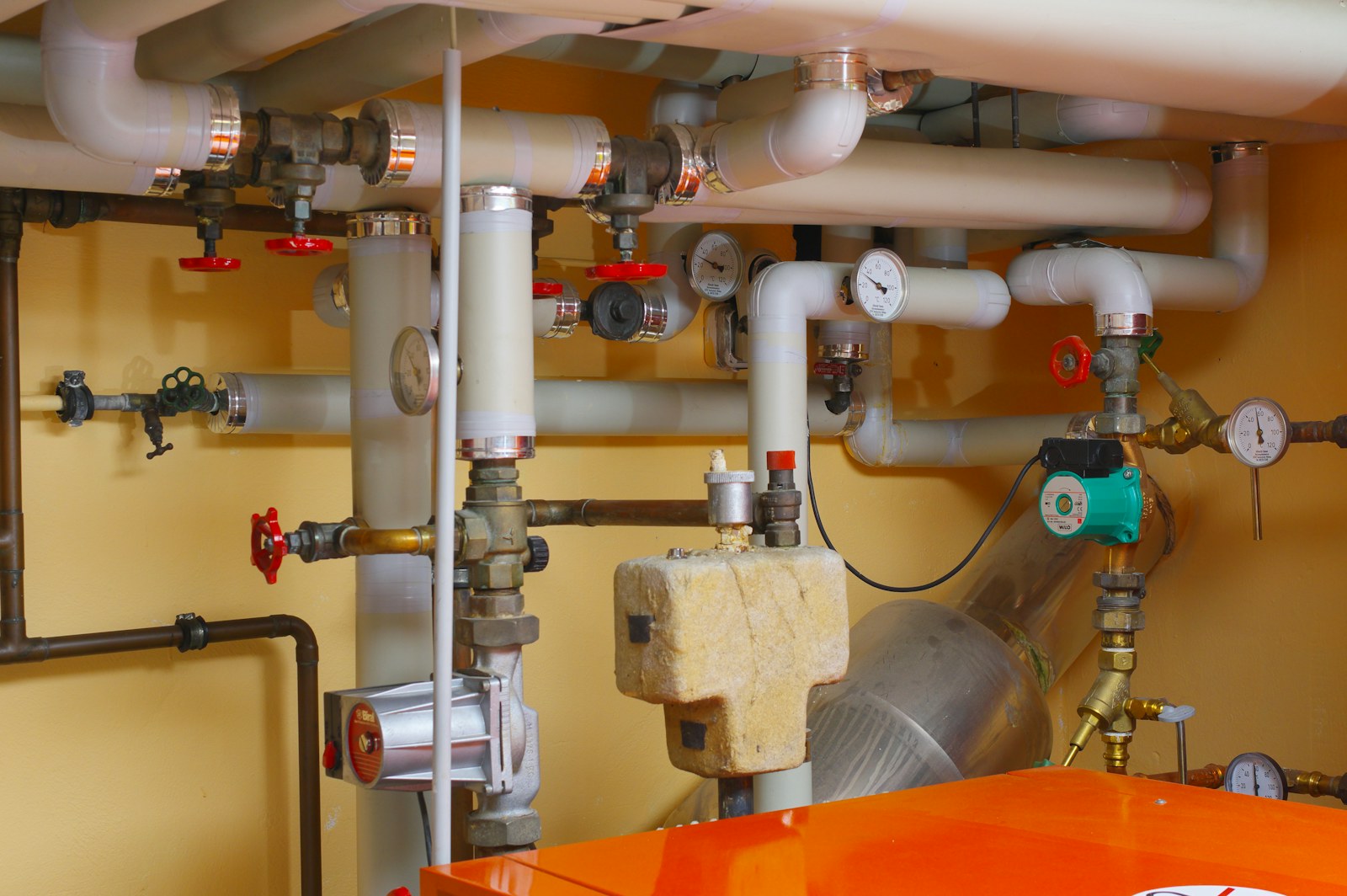 A close view of clean sink and faucet plumbing fixtures